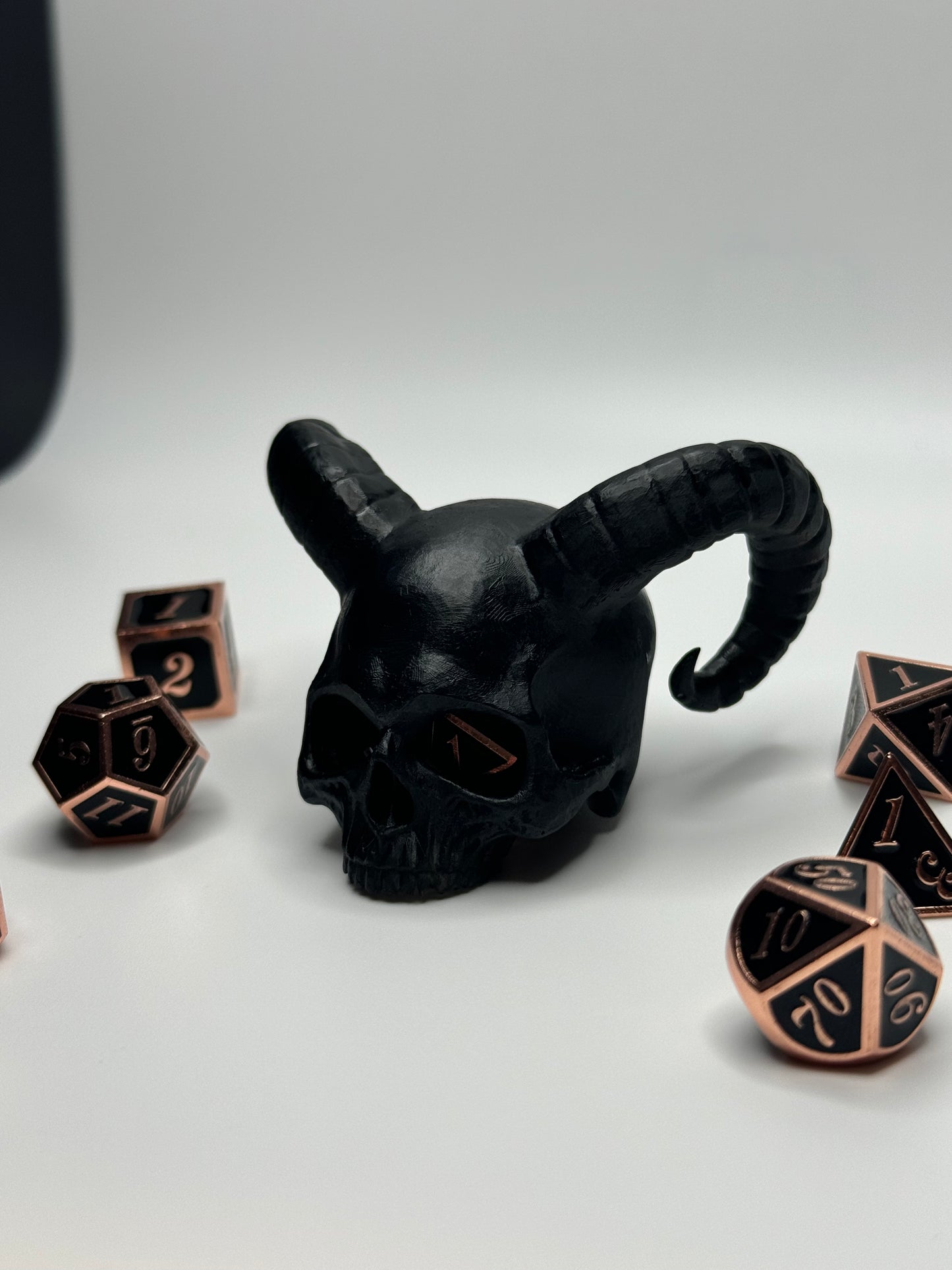 Unique demon skull dice jail, perfect for tabletop gamers looking to punish their rogue dice during Dungeons & Dragons or other RPG sessions.