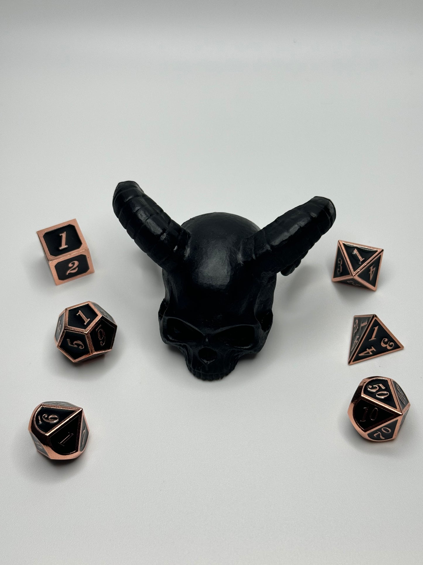 Unique demon skull dice jail, perfect for tabletop gamers looking to punish their rogue dice during Dungeons & Dragons or other RPG sessions.