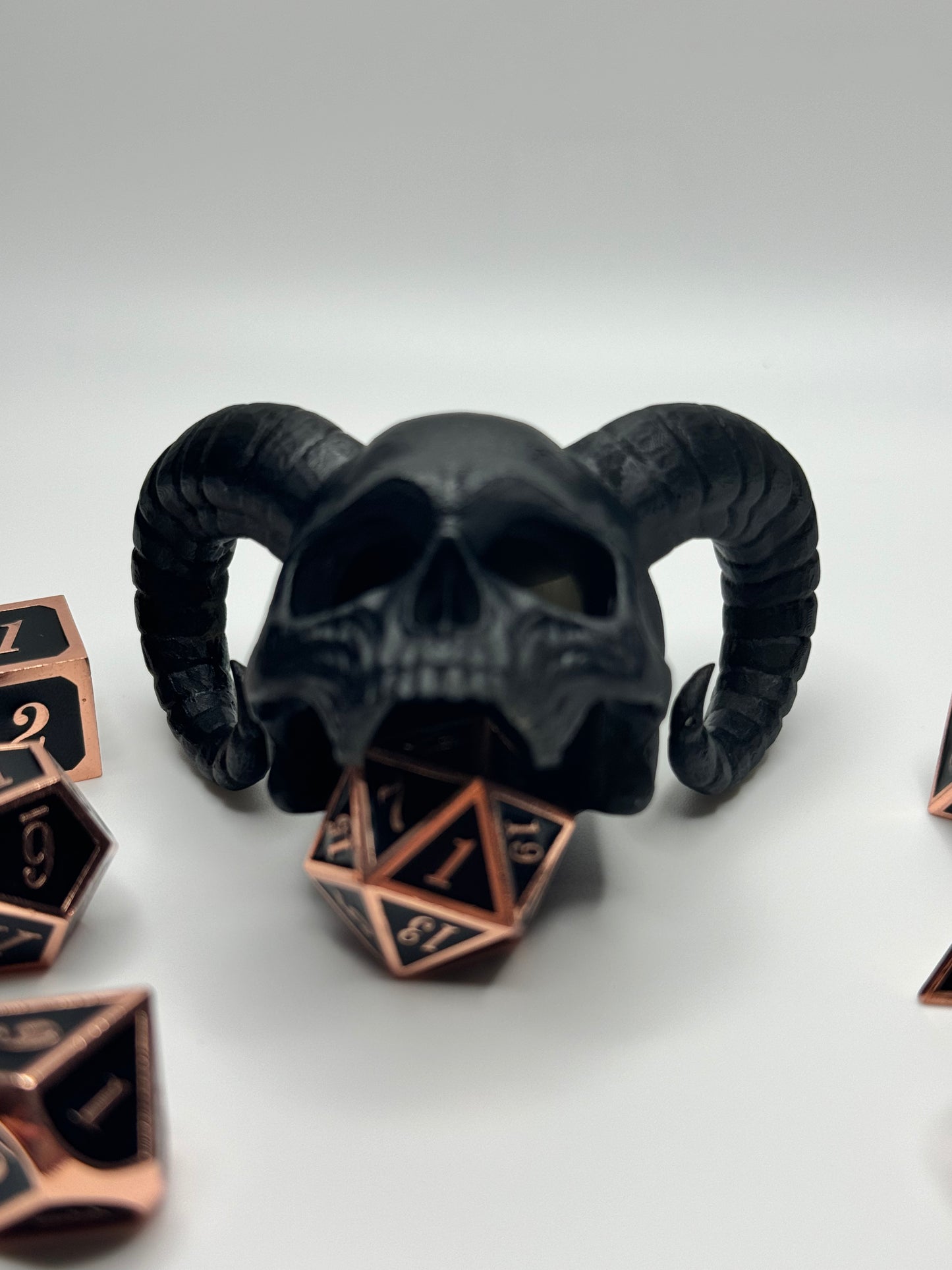 Unique demon skull dice jail, perfect for tabletop gamers looking to punish their rogue dice during Dungeons & Dragons or other RPG sessions.